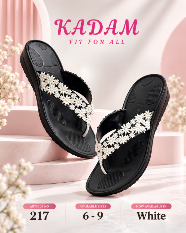 KADAM Ladies 217 slippers with white floral straps and black soles, sizes 6–9